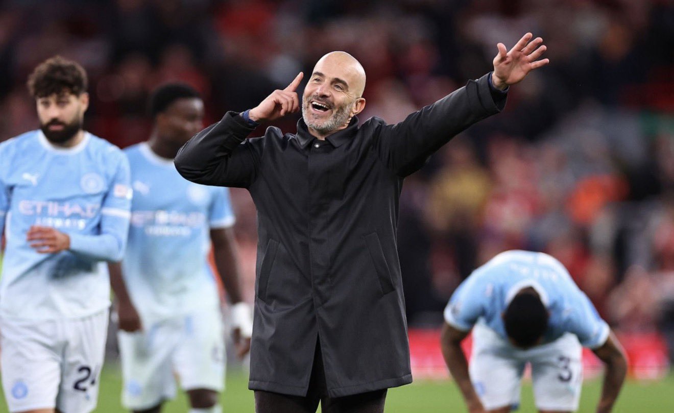 Manchester City manager Enzo Maresca celebrates his team's 3-0 victory over Liverpool at Anfield.