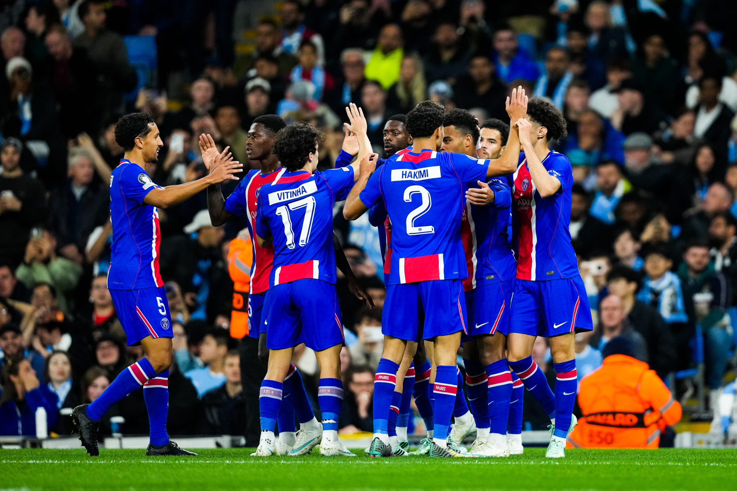 Paris Saint-Germain players celebrate their 4-2 Champions League victory over Manchester City at the Etihad Stadium.