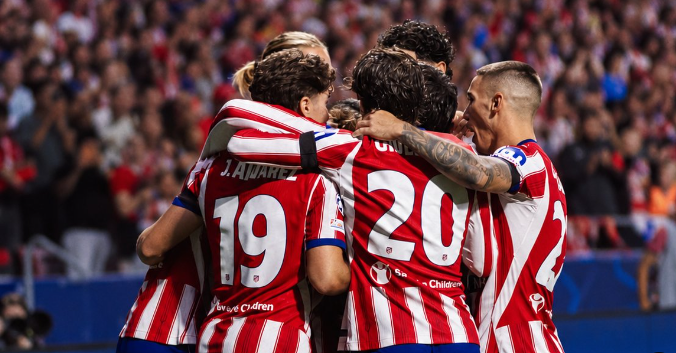 Atlético Madrid players celebrate their 2-0 Champions League victory over Manchester United.